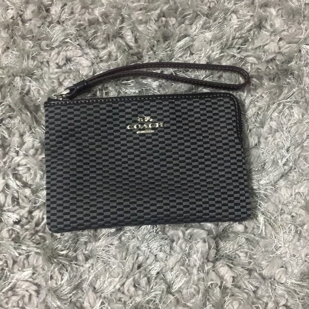 Black patterned Coach clutch